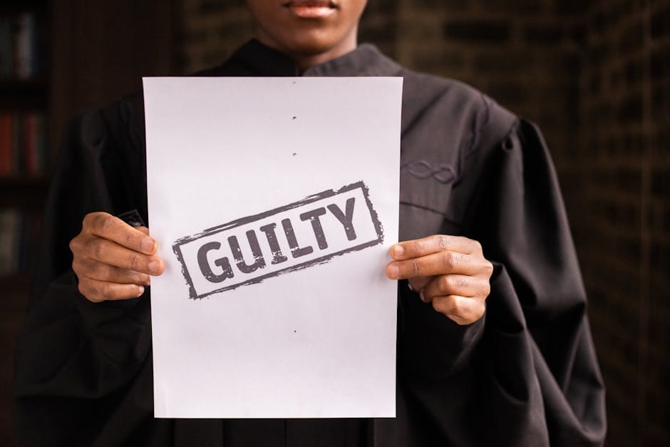 A judge in a courtroom holding a paper with a guilty verdict, symbolizing law and justice.