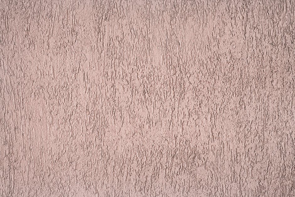 Detailed close-up view of a rough textured brown wall showcasing its unique pattern.