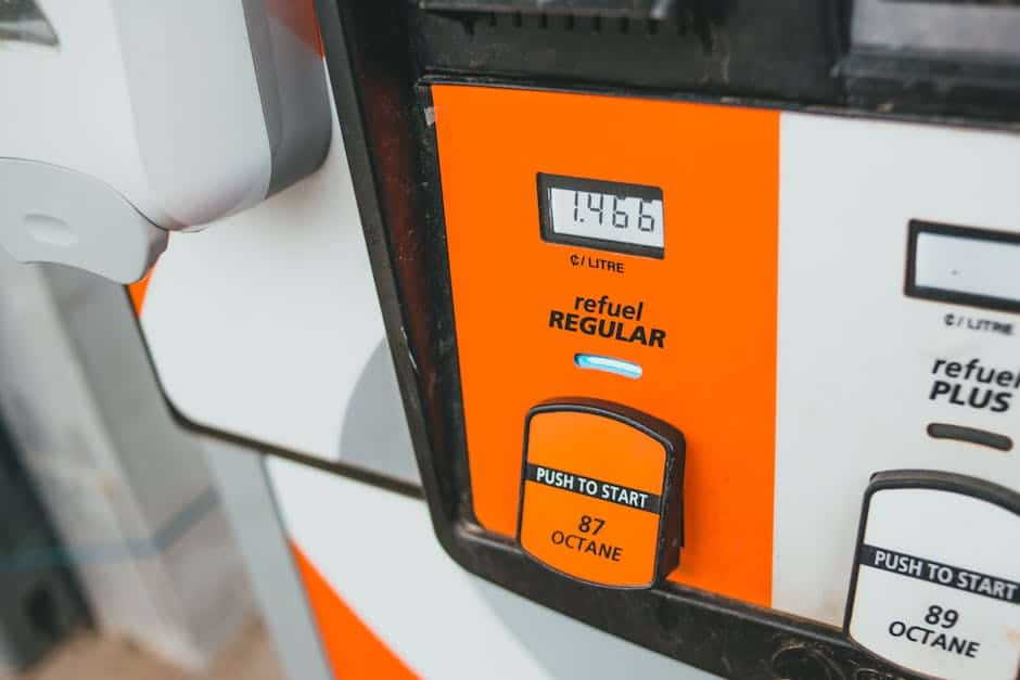 Detailed view of a gas pump showing price and octane level 87.