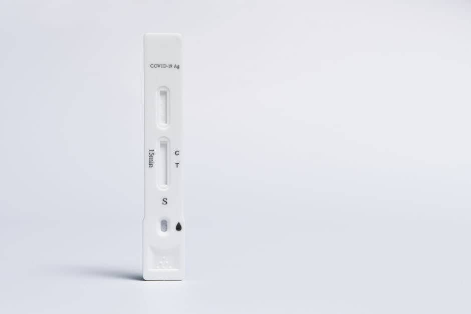 Isolated COVID-19 rapid antigen test on a white background, showing test and control lines.